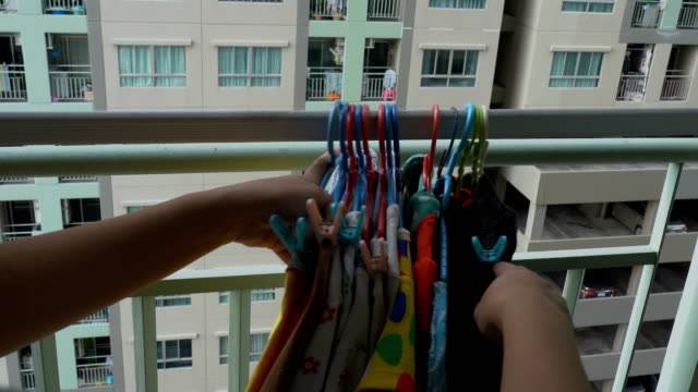 Keep-dried-colorful-clothes-back-from-drying-rack.