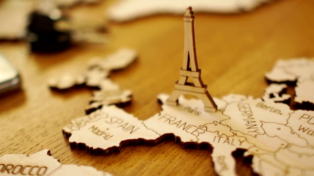 Map-of-Europe,-France,-wooden-model.-Eiffel-Tower.-Tourist-attractions,-travel-planning