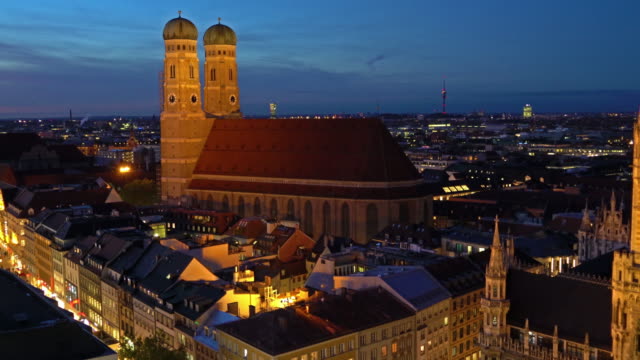 Aerial-view-of-Frauenkirche-at-night,-Munich,-Bavaria,-Germany