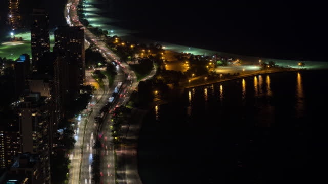 Chicago-North-Avenue-Beach-and-Lake-Shore-Dr-at-Night-Aerial-Timelapse