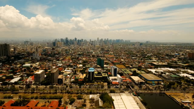 Aerial-city-with-skyscrapers-and-buildings.-Philippines,-Manila,-Makati