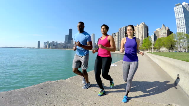 Multi-Ethnic-American-male-and-females-running-Chicago