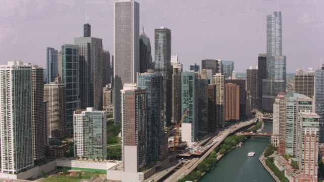 Aerial-approach-to-downtown-Chicago-from-Chicago-River.