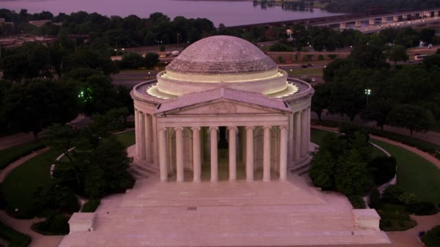 Flying-directly-over-Jefferson-Memorial-at-sunrise.