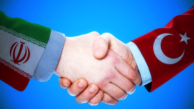 Iran---Türkei-/-Handshake-Konzept-Animation-über-Länder-und-Politik-/-mit-Matte-Kanal