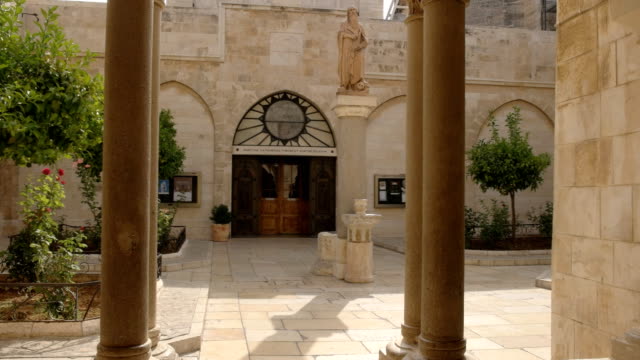 tilt-up-shot-in-the-courtyard-of-the-church-of-the-nativity
