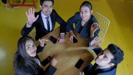 Indian-business-woman-and-men-dressed-in-formals-working-together