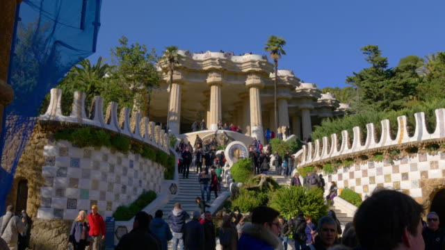 gaudi-park-guell-sunny-day-crowded-main-entrance-4k-barcelona-spain