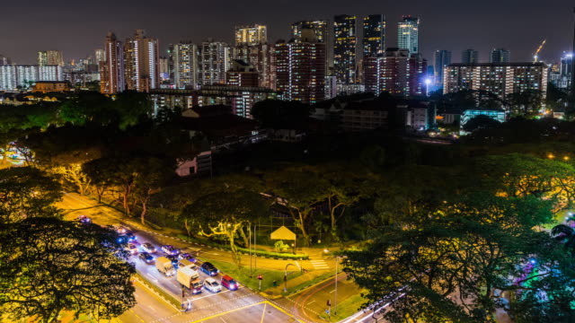 Vista-del-horizonte-de-centro-de-la-ciudad-de-Singapur,-lapso-de-tiempo-de-escena-de-noche-de