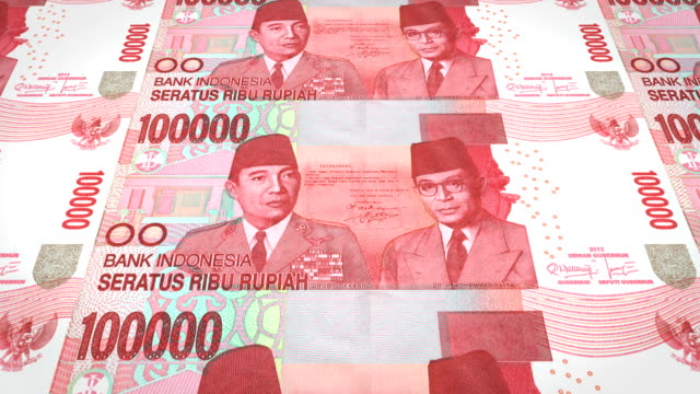Banknoten-der-hunderttausend-indonesische-Rupiah-Rollen,-Bargeld,-Schleife