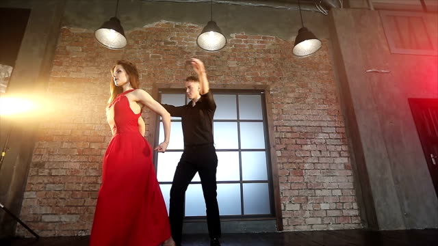 Professional-dancers-dancing-tango-in-ballroom.