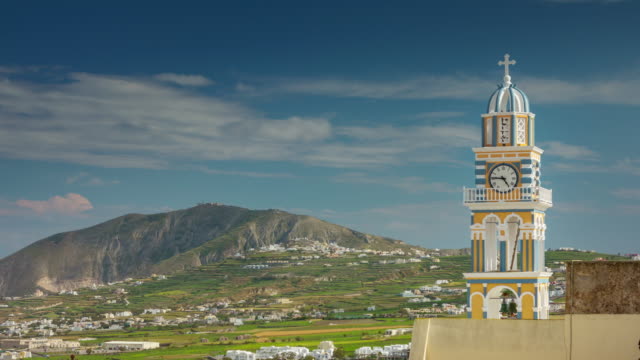 sunny-day-santorini-island-famous-fira-town-church-clock-tower-panorama-4k-time-lapse-greece