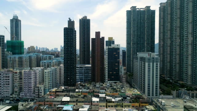 The-drone-flies-above-apartment-blocks,-very-dense-housing-development.