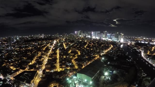 Noche-de-lapso-de-tiempo-vista-de-noche-de-la-ciudad-de-Manila