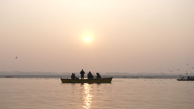Boats-floating,-Ganges-River,-Varanasi,-India