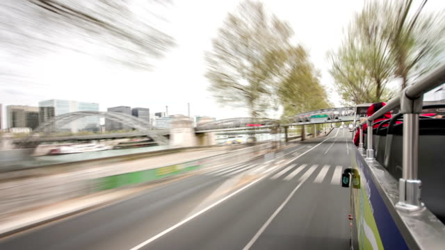 View-from-moving-touristic-bus-on-road-and-buildings-is-Paris,-France,-timelapse-part-2