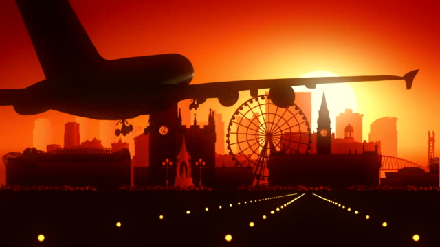 Manchester-Flugzeug-Landung-goldenen-Sonnenuntergang