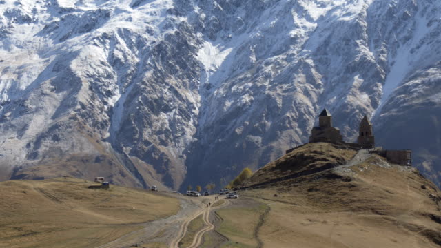 Ancient-Gergeti-Trinity-church-near-mount-Kazbek,-Caucasus-mountains.