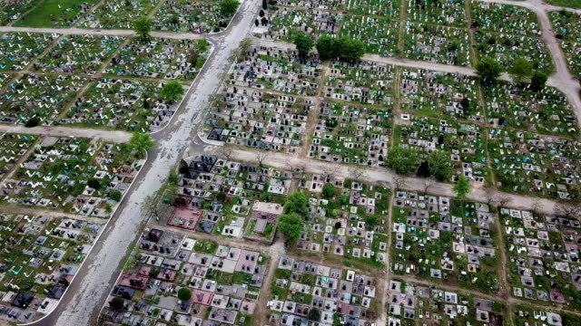 An-aerial-over-a-vast-cemetery-of-headstones-honors-veterans