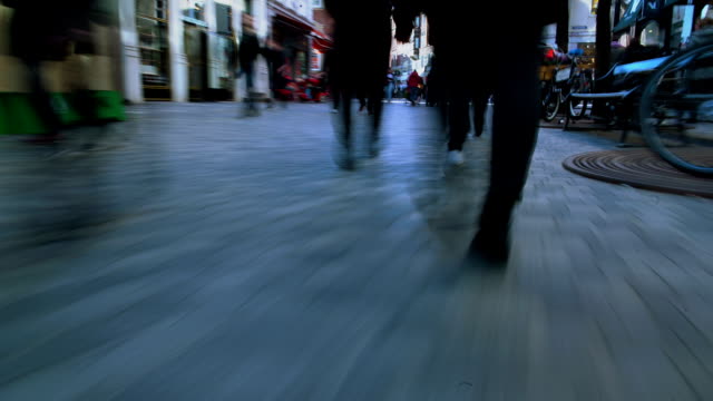 Busy-time-on-pedestrian-street-of-Copenhagen,-people-rushing-in-city,-time-lapse