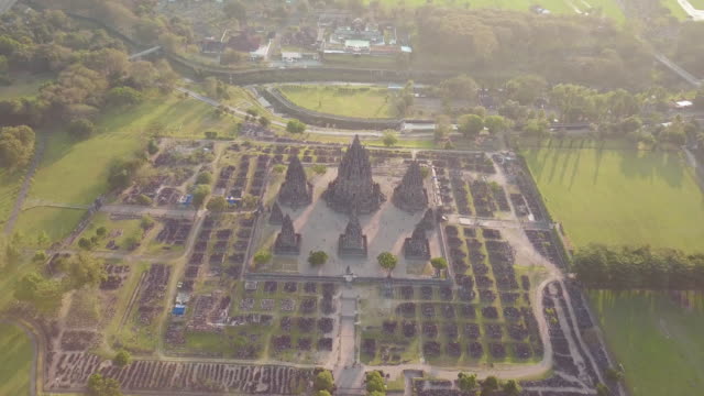 9th-Century-Prambanan-temple-aerial-view-at-sunset-which-is-a-UNESCO-site,-Yogyakarta,-Indonesia