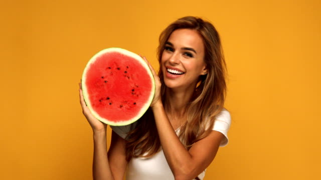 Beautiful-woman-holding-watermelon