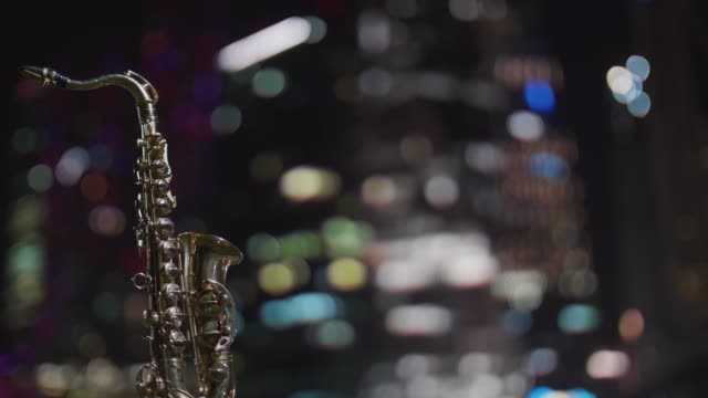 Night-city-and-saxophone