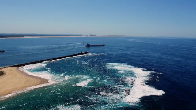 drone-aerial-shot-of-a-coal-freighter-leaving-newcastle