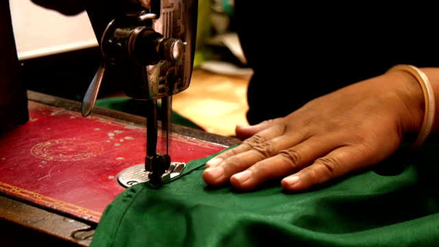 india,-seamstress-at-work,-close-up
