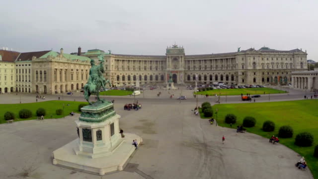 OSCE-headquarters-in-Vienna-on-Heldenplatz,-rider-statue,-aerial.-Beautiful-aerial-shot-above-Europe,-culture-and-landscapes,-camera-pan-dolly-in-the-air.-Drone-flying-above-European-land.-Traveling-sightseeing,-tourist-views-of-Austria.