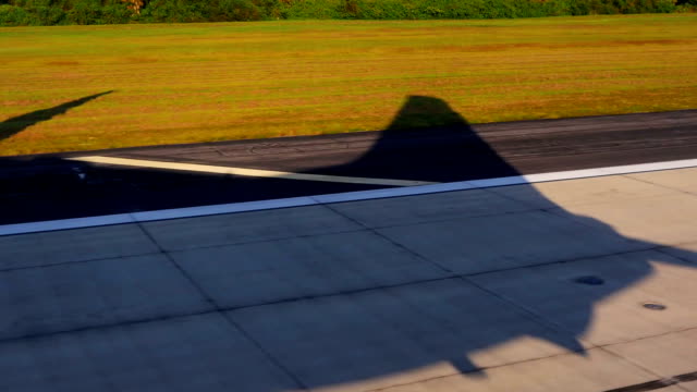 Aerial-Plane-shadow-taking-off-from-Florida-Airport
