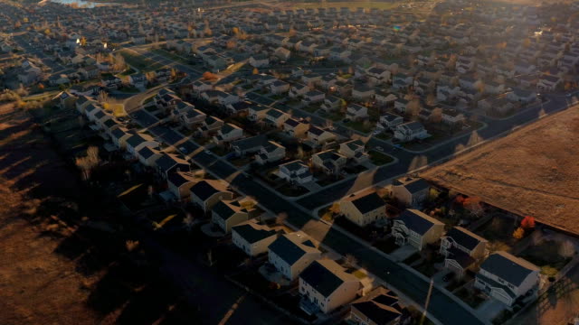 AERIAL:-Big-suburban-village-with-modern-row-houses-on-sunny-morning-in-USA