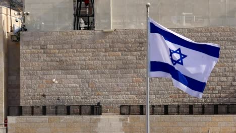 Flag-of-Israel-is-waving-and-flying-on-the-wind