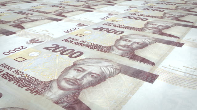 Banknoten-der-zweitausend-indonesische-Rupiah-Rollen,-Bargeld,-Schleife