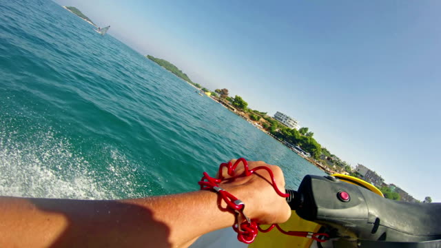 Jetski-sport-race-pov-on-circa-August-in-Corfu,-Greece.-Tourism-and-recreation-is-main-source-of-income-to-Corfu-island.-Beautiful-clear-green-water