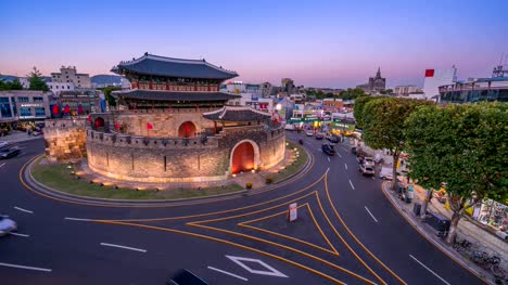 Time-Lapse-Hwaseong-Fortress-Gate,-Suwon,-and-traffic-in-Seoul,-South-Korea.