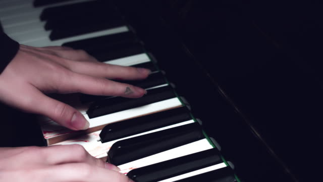 4k-Halloween-Shot-of-Bloody-Hands-on-Piano-in-Horror-Style