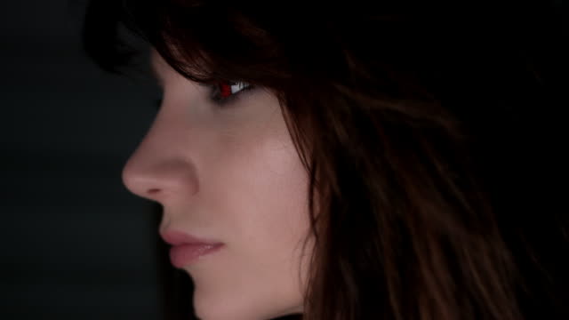 4k-Horror-Shot-of-a-Sexy-Woman-Looking-with-Red-Eyes