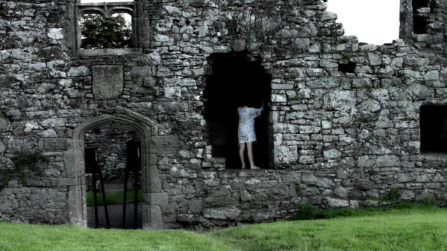4k-Horror-Shot-of-an-Abandoned-Child-Hiding-Scared-in-Ruins