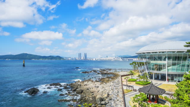 Time-lapse-of-Busan-City-and-Haeundae-Beach-at-Busan-in-Korea.Zoom-in
