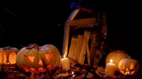 Halloween-Friedhof,-Kerzen-und-Jack-o-Laterne