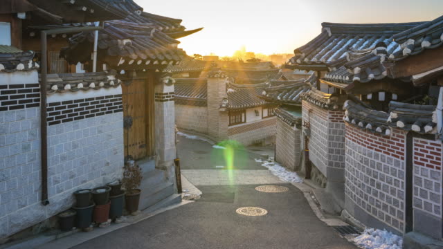 Timelapse-video-of-Sunrise-at-Bukchon-Hanok-Village-in-Seoul-city,-South-Korea,-Time-Lapse-4K