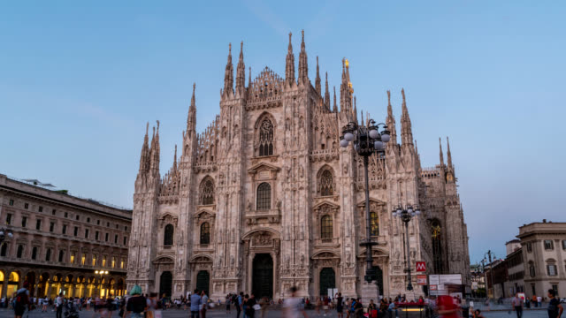 Milan-city-skyline-night-to-day-sunrise-timelapse-at-Milano-Duomo-Cathedral,-Milan,-Italy-4K-Time-lapse