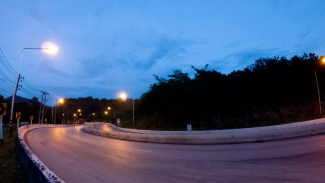 Time-Lapse--Traffic-in-the-evening-on-a-mountain-road.