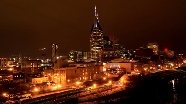 Night-timelapse-of-Nashville,-Tennessee-city-center-at-river