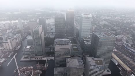 4K-Canary-Wharf-Towers-and-Buildings-in-London-Overhead-Aerial-Shot