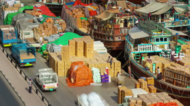 sunny-day-dubai-deira-cargo-port-ship-parking-4k-time-lapse-united-arab-emirates