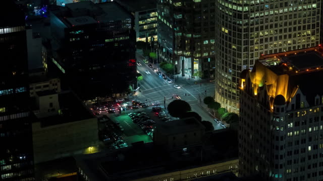 Downtown-Los-Angeles-Traffic-Intersection-Aerial-Rooftop-Night-Timelapse