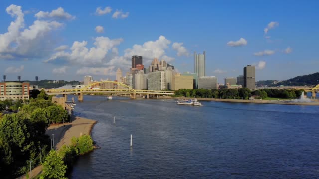 Slow-Forward-Aerial-Wide-Shot-of-Summer-Pittsburgh-Skyline