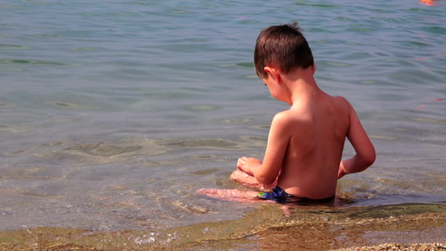 Little-boy-on-a-sea-beach